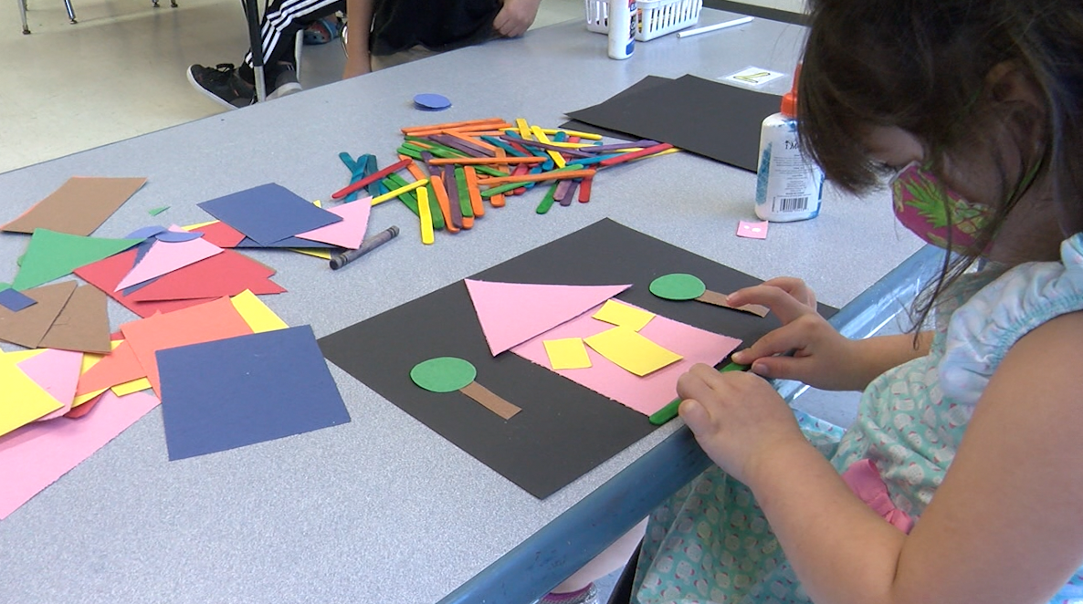 An El Paso child doing arts and crafts at the YWCA childcare. 