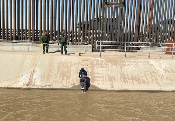Border Patrol agents conduct a water rescue in El Paso's American Canal.
