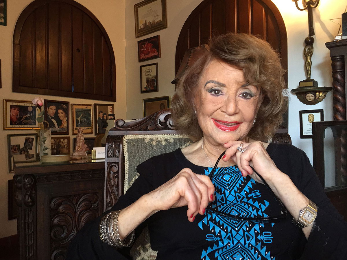 Delia Fiallo poses in her studio in her house in Miami.