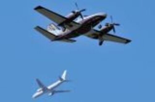 The turboprop seen flying in the upper portion of this image from Flight Aware is the plane under investigation by federal authorities.