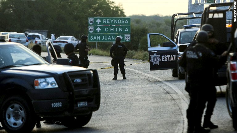 Mexican federal police block a road leading to Reynosa in this file photo.