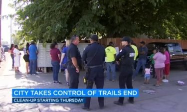 Residents meet with police about rising crime and health hazards at the Trails End mobile home park in Fresno