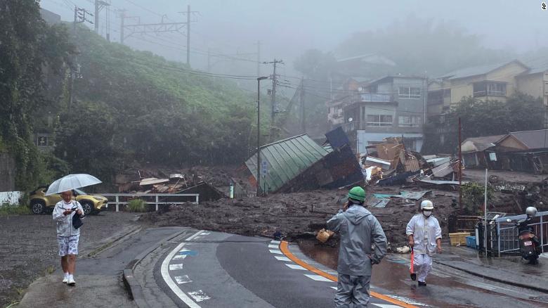 A road is covered by mud and debris following heavy rain in Atami city, Japan.