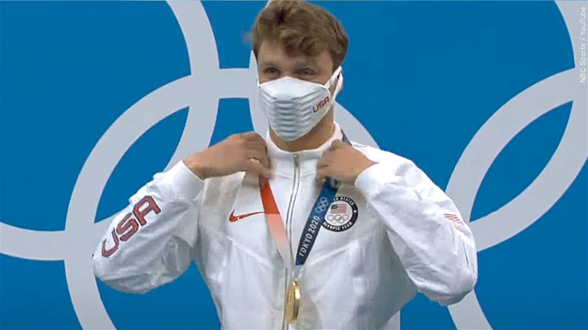Team USA swimmer Bobby Finke is awarded a gold medal at the Tokyo Olympics.