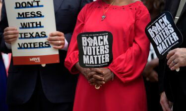 Democratic caucus members of the Texas House join a rally on the steps of the Texas Capitol to support voting rights