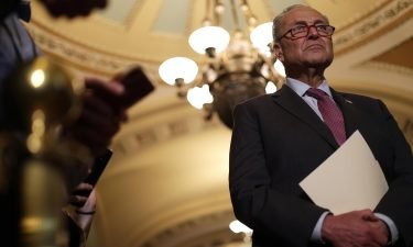 Sen. Chuck Schumer listens during a news briefing at the U.S. Capitol July 13 in Washington