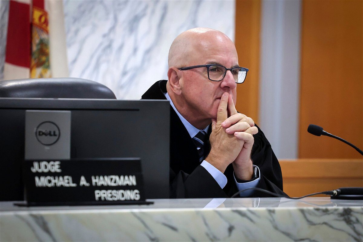 <i>Carl Juste/AP</i><br/>Miami-Dade Circuit Judge Michael Hanzman listens as tenants share their thoughts regarding the future of the site of the Champlain Towers South building that collapsed in Surfside.