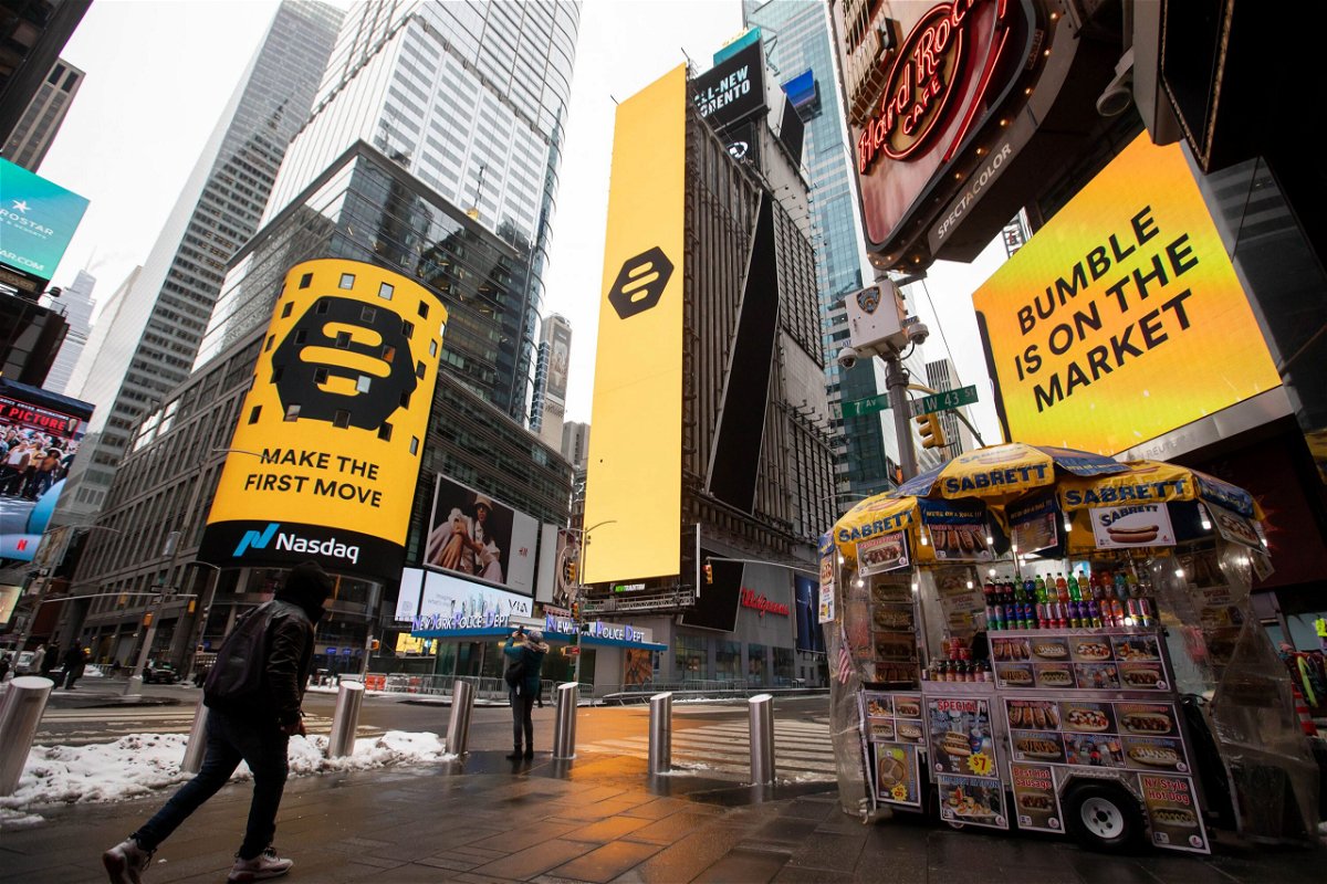<i>Michael Nagle/Bloomberg/Getty Images</i><br/>Monitors display Bumble Inc. signage during the company's initial public offering (IPO) in front of the Nasdaq MarketSite in New York on Thursday