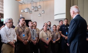 President Joe Biden greets first responders to the collapse of the 12-story Champlain Towers South condo building in Surfside
