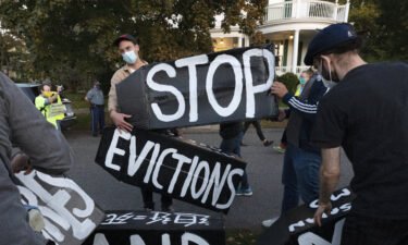 The White House announced Thursday that it would not ask the CDC to again extend the protection to ban evictions. Housing activists are shown erecting a sign in Swampscott