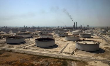 Crude oil storage tanks at the Juaymah Tank Farm in Saudi Aramco's Ras Tanura oil refinery and oil terminal in Ras Tanura