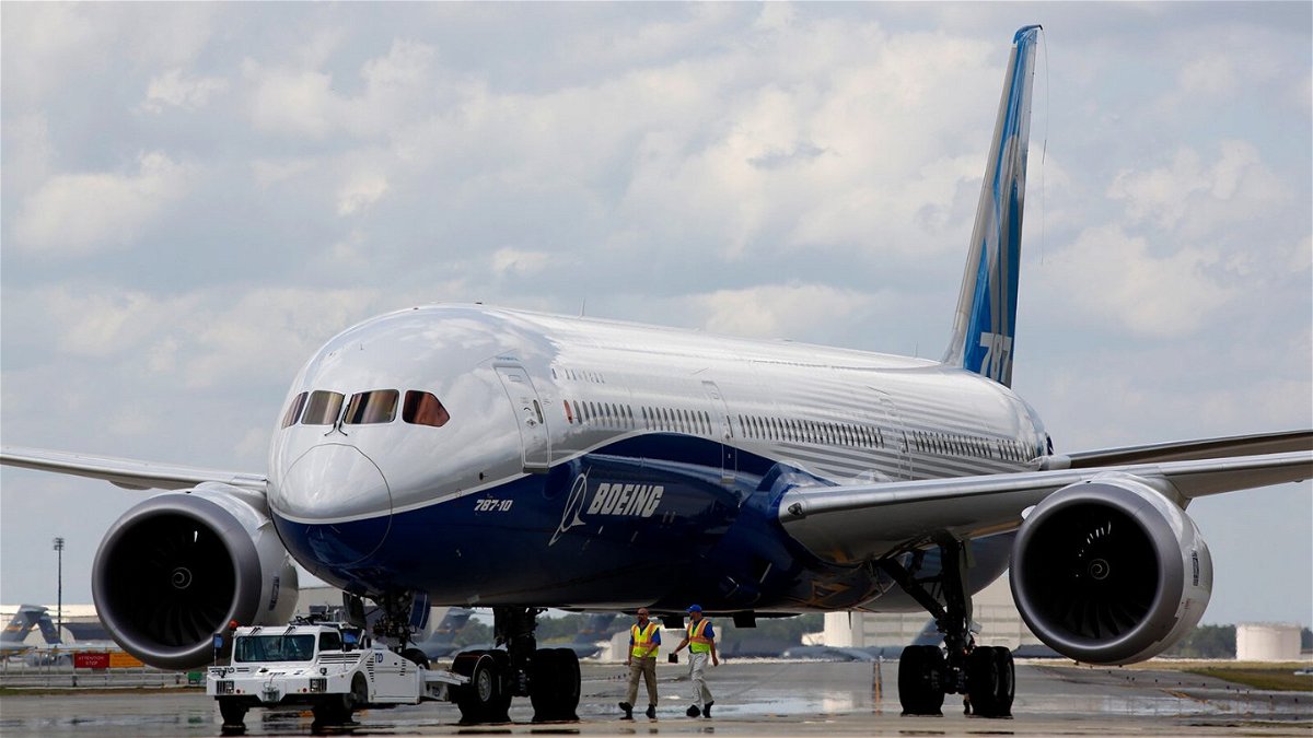 <i>Mic Smith/AP</i><br/>Boeing employees walk the Boeing 787-10 Dreamliner down towards the delivery ramp area at the company's facility in South Carolina after conducting its first test flight in 2017. On July 13 Boeing disclosed a new issue with the jet