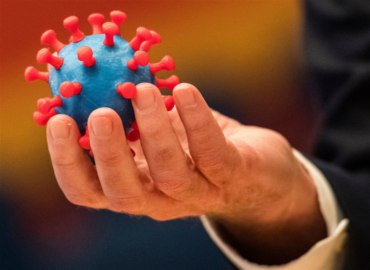 <i>JENS SCHLUETER/AFP/Getty Images</i><br/>A model of the novel coronavirus SARS-CoV-2.