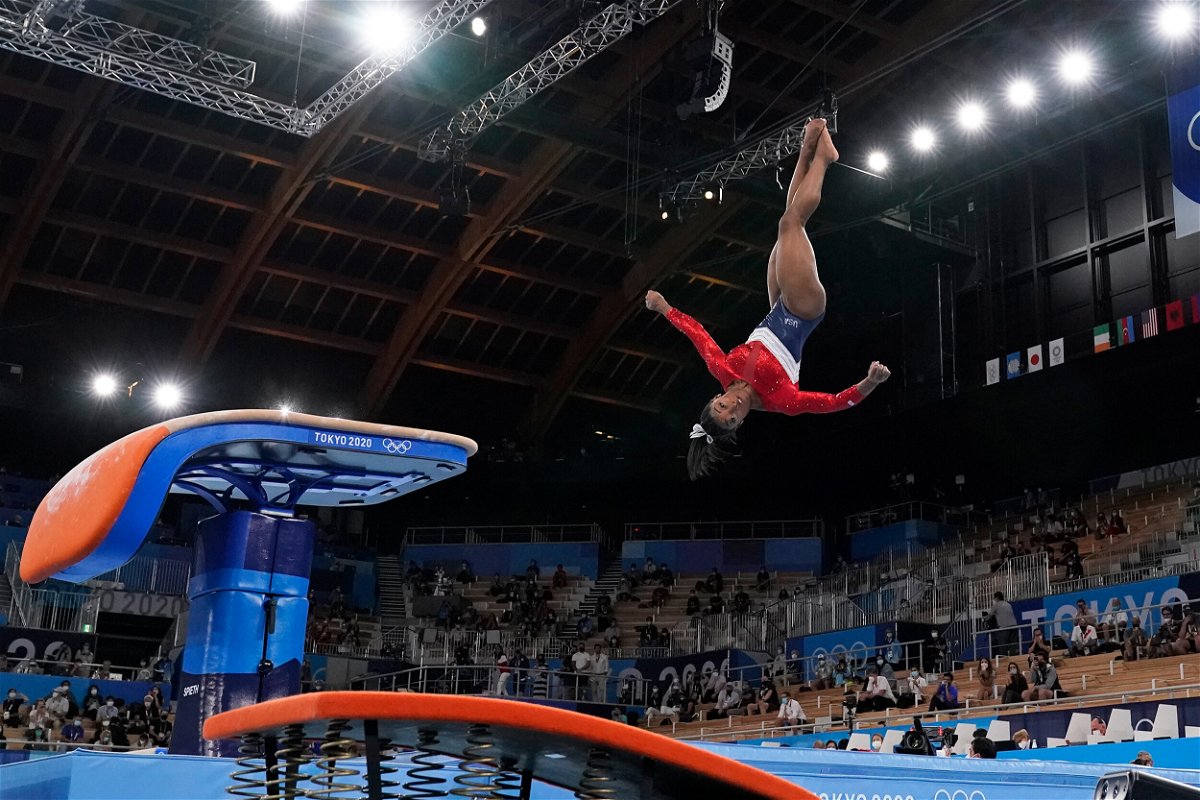 <i>Ashley Landis/AP</i><br/>Simone Biles performs on the vault during the artistic gymnastics women's final at the 2020 Summer Olympics.