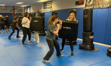 Flight attendants train at a gym in Florida.