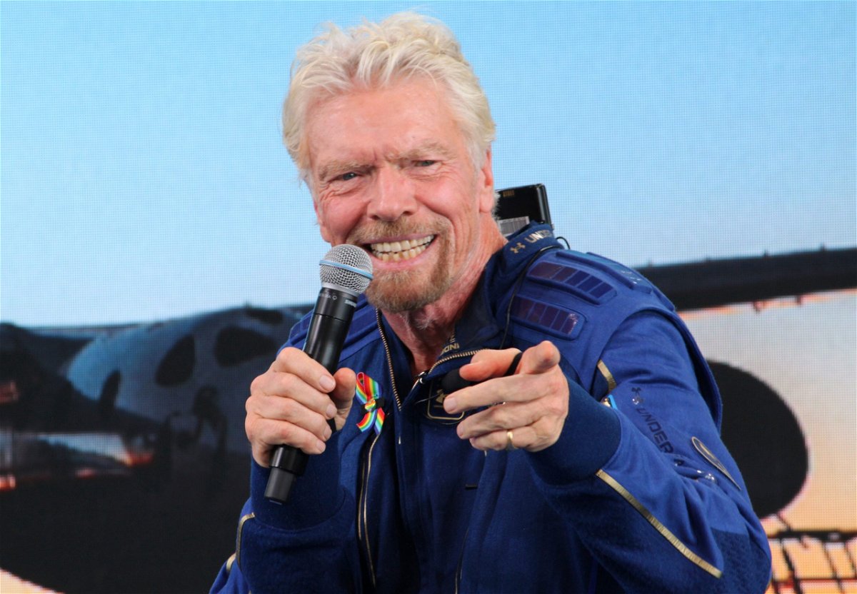 <i>Susan Montoya Bryan/AP</i><br/>Richard Branson answers questions after successfully going to the edge of space on July 11.