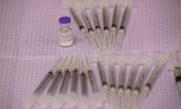 Doses of the Pfizer Covid-19 vaccine await to be administered at a Los Angeles County mobile vaccination clinic on May 14 in Los Angeles