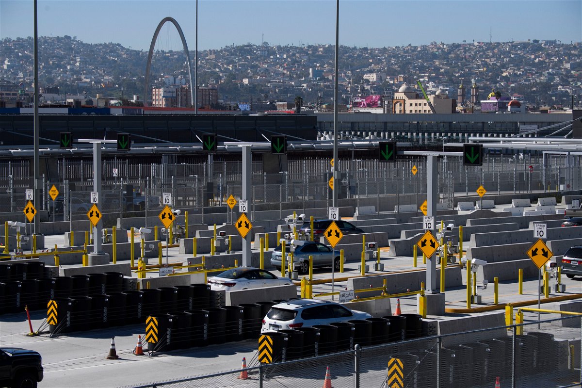 Vehicles enter a checkpoint as they approach the Mexico border at the US Customs and Border Protection San Ysidro Port of Entry at the US- Mexico border on February 19 in San Diego.