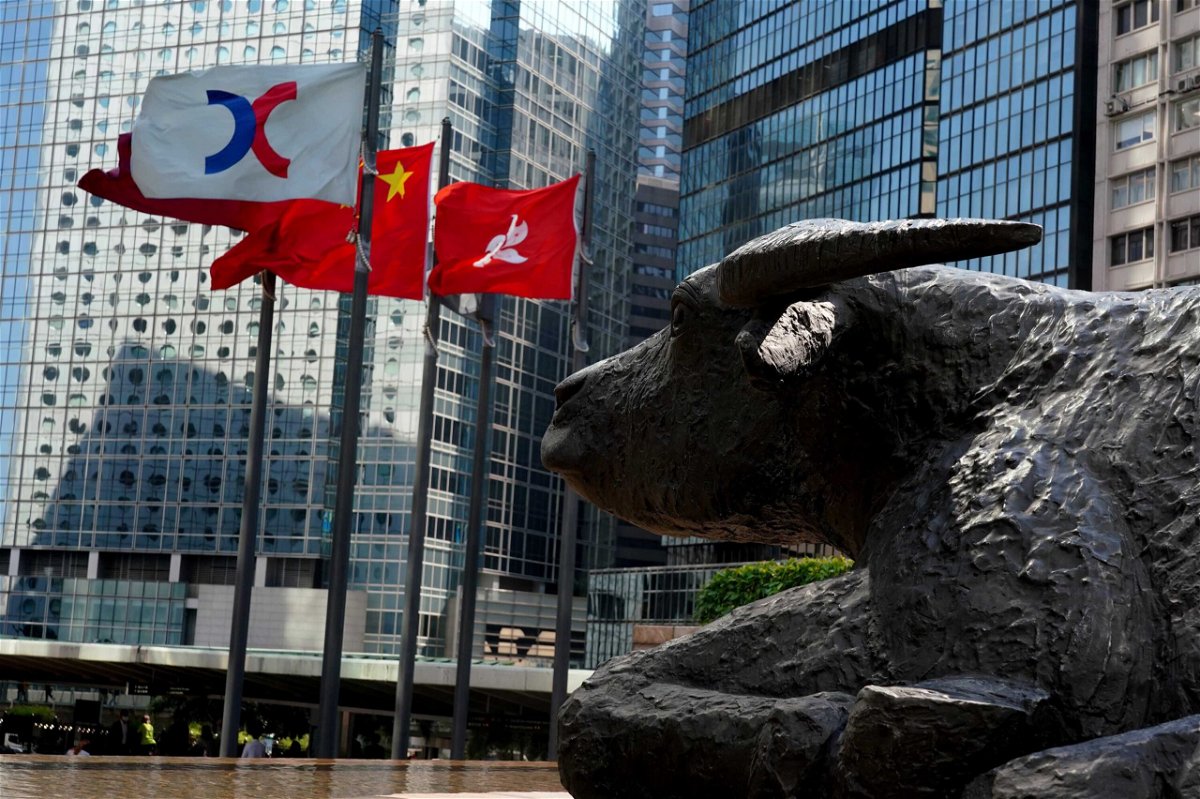 <i>Zhang Wei/China News Service/Getty Images</i><br/>The Chinese and Hong Kong flags flutter outside the Exchange Square complex