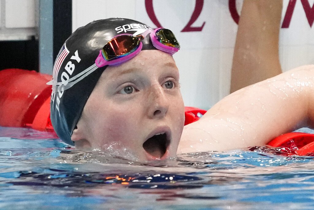 Lydia Jacoby, of the United States, reacts after winning the final of the women's 100-meter breaststroke.