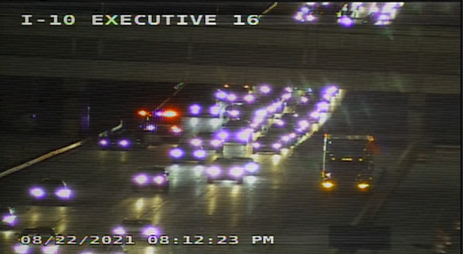 Emergency crews at the scene of a rollover on I-10 at Executive.