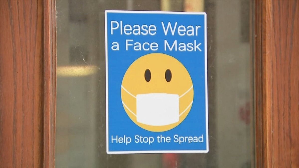 <i>WLS</i><br/>A sign asking people to wear a face mask.