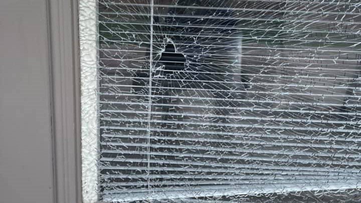 A broken window that was shattered at the home of EPISD trustee Freddy Klayel-Avalos.