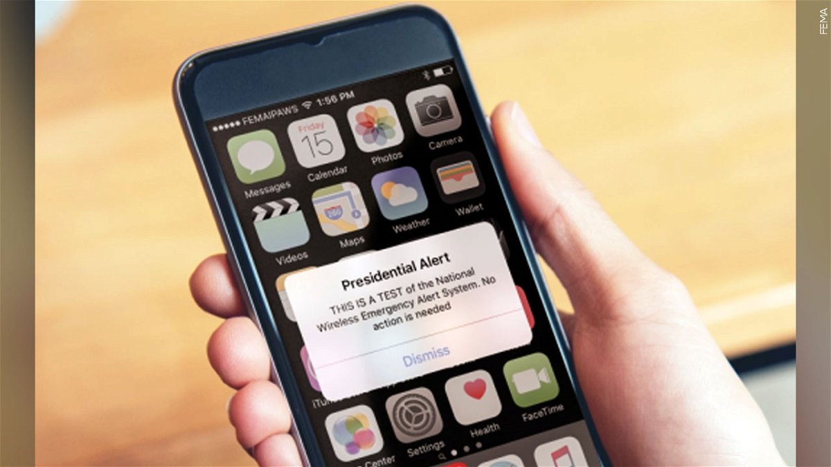 A cell phone receives an emergency alert system test message.