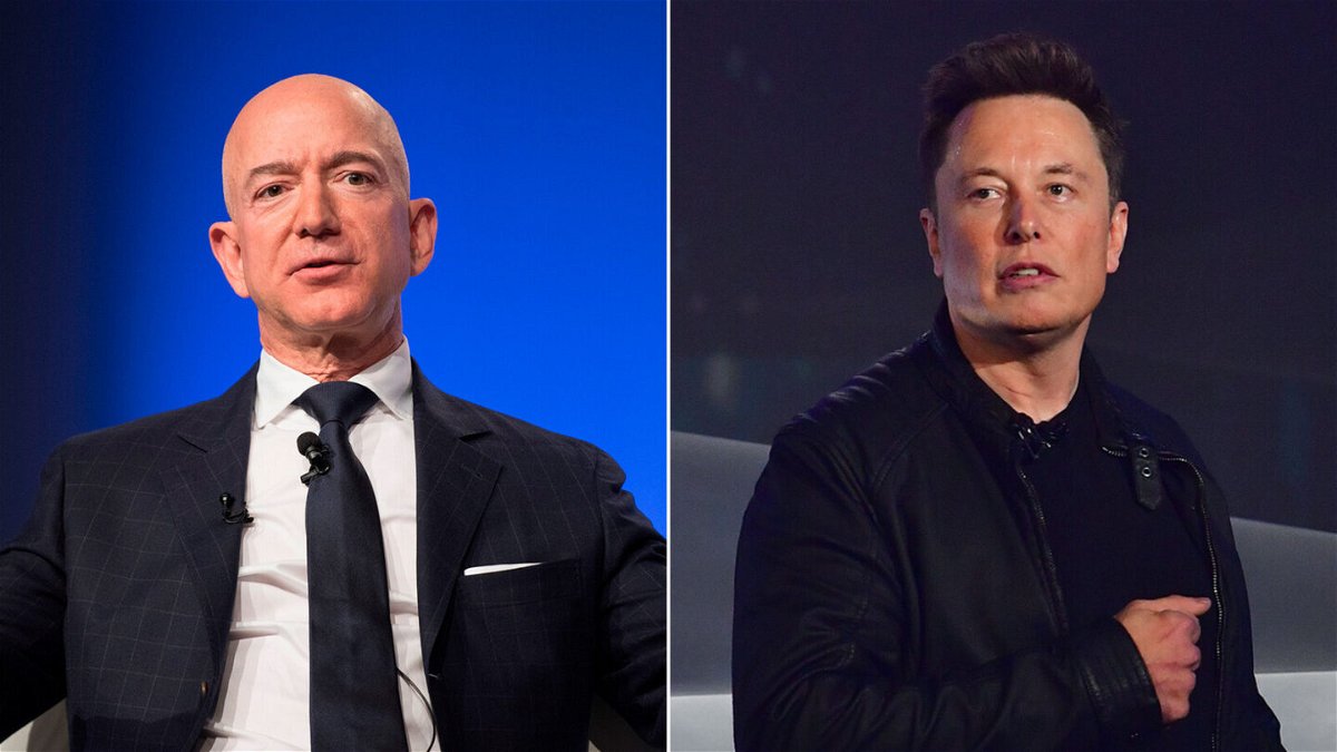 <i>Jim Watson/Frederic J. Brown/AFP/Getty Images</i><br/>Elon Musk and Jeff Bezos