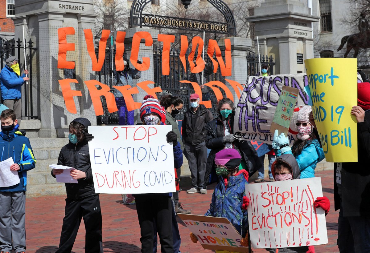 <i>Jim Davis/The Boston Globe/Getty Images</i><br/>People Rally To Bring Back Eviction Moratorium