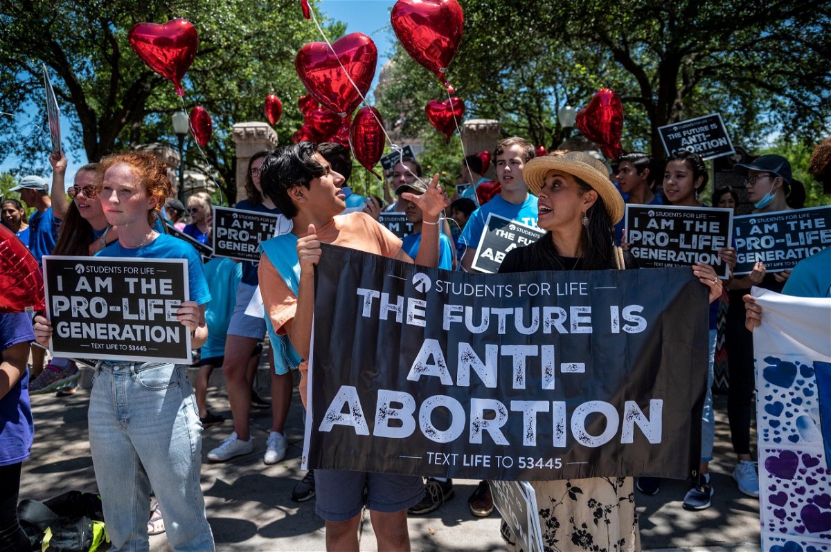 <i>Sergio Flores/Getty Images</i><br/>Texas 6-week abortion ban lets private citizens sue abortion providers in an unprecedented legal approach. Abortion protesters here stand outside the Texas state capitol.