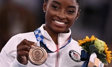 Simone Biles will head this fall to 35 US cities for a series of exhibitions called the "Gold Over America Tour." Biles won a bronze medal in the women's balance beam competition on Tuesday.