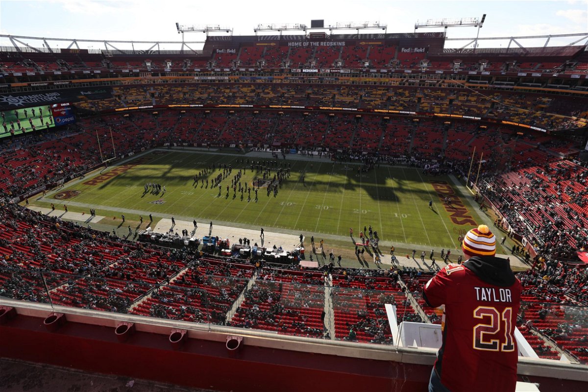 <i>Patrick Smith/Getty Images</i><br/>Washington fans stand in the upper deck at FedExField in Landover