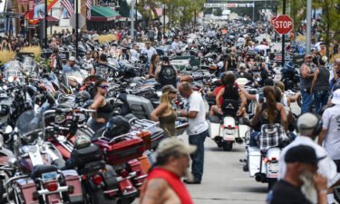 Motorcycles and people crowd Main Street during the 80th Annual Sturgis Motorcycle Rally on August 7