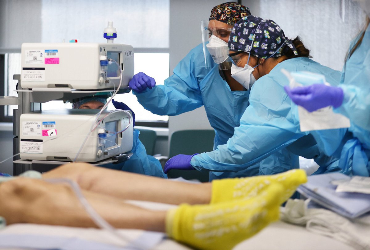 <i>Mario Tama/Getty Images</i><br/>Clinicians work on intubating a COVID-19 patient in the Intensive Care Unit (ICU) at Lake Charles Memorial Hospital on August 10 in Lake Charles
