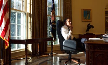 "Obama: In Pursuit of a More Perfect Union" documents Barack Obama's life and presidency. Obama is seen here in the Oval Office on his first day in office on Jan. 21