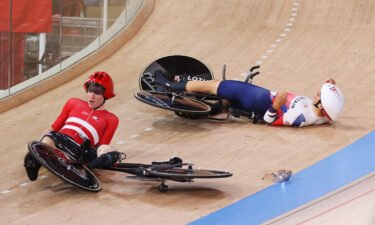 Frederik Madsen of Team Denmark and Charlie Tanfield of Team Great Britain on the ground after the fall.