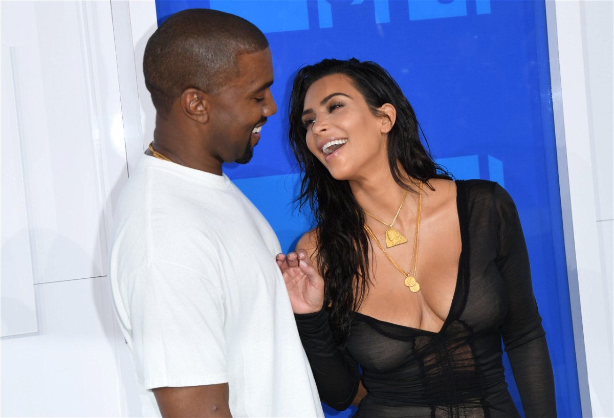 <i>Angela Weiss/AFP via Getty Images</i><br/>Kanye West's latest listening party stirs hope of Kim Kardashian reconciliation. The couple here arrive for the 2016 MTV Video Music Awards August 28