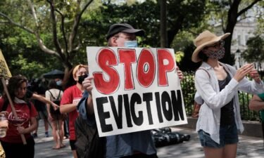 Activists hold a protest against evictions near City Hall on August 11 in New York City.