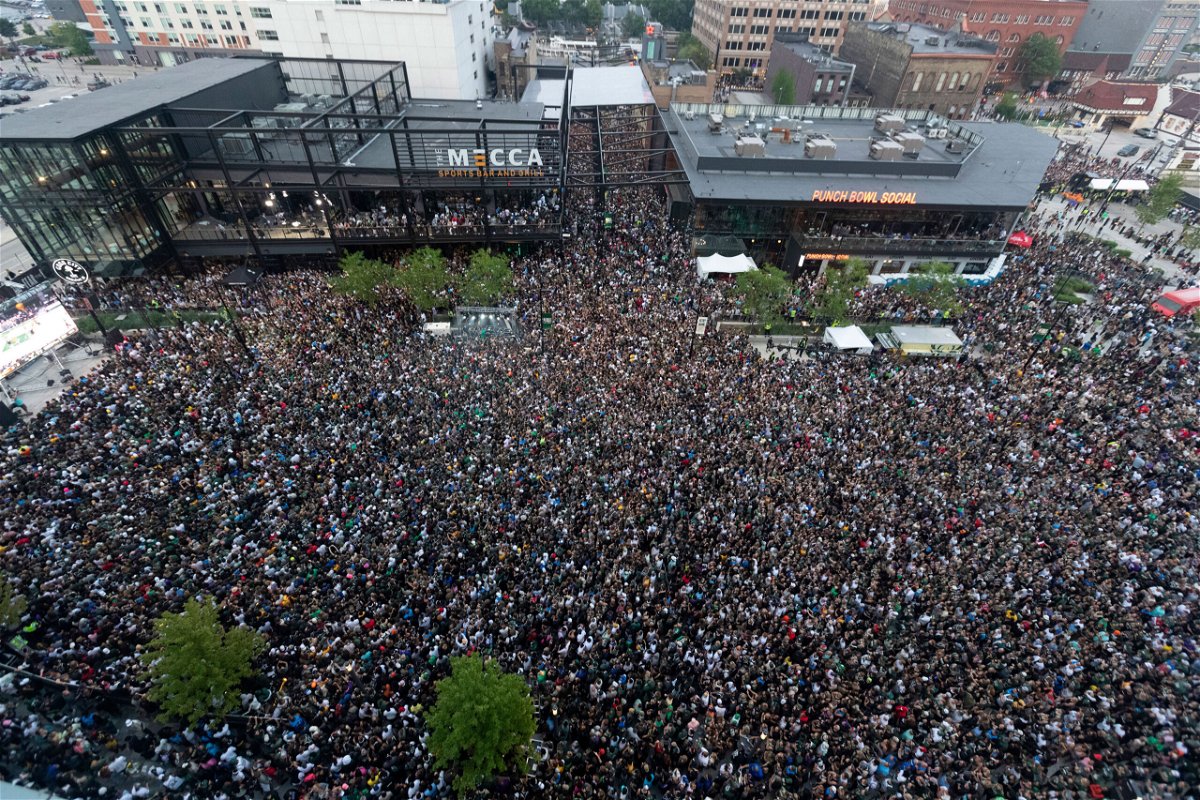 <i>Mark Hoffman/Milwaukee Journal Sentinel/USA Today Network</i><br/>Fans pack the Deer District during game six of the 2021 NBA Finals at Fiserv Forum on July 20.  Nearly 500 cases of Covid-19 have been reported following the event.
