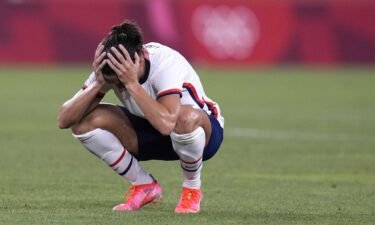 Carli Lloyd reacts after being defeated 1-0 by Canada during the women's semifinal soccer match at the 2020 Summer Olympics.