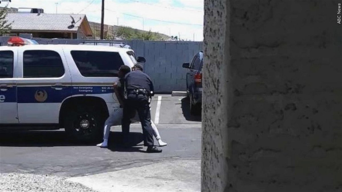 A Phoenix police officer makes an arrest in this file photo.