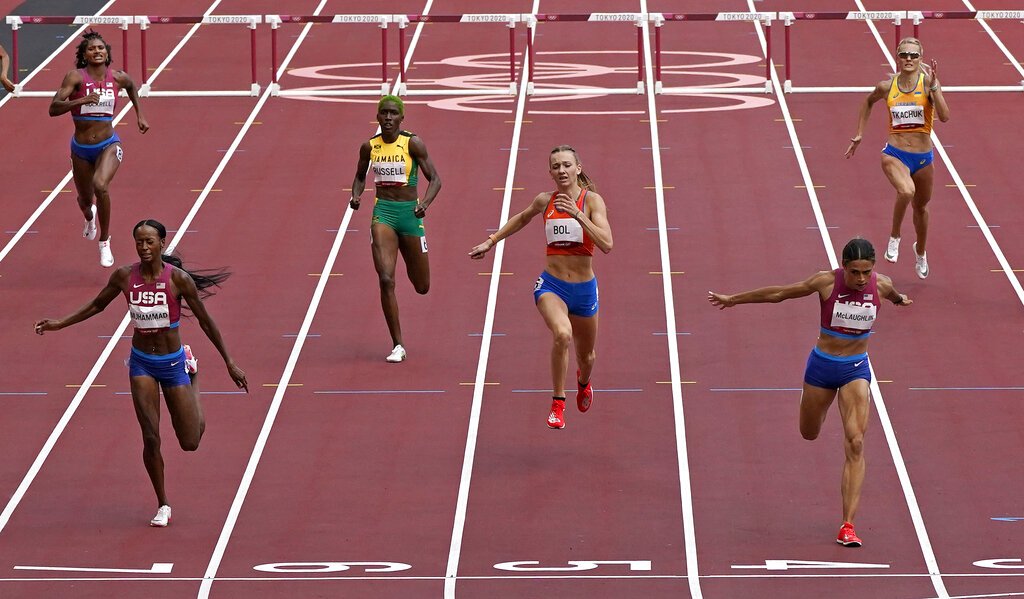 Sydney Mclaughlin, of United States wins the gold medal in the final of the the women's 400-meter hurdles ahead of Dalilah Muhammad, of United States, silver, and Femke Bol, of Netherlands, bronze.