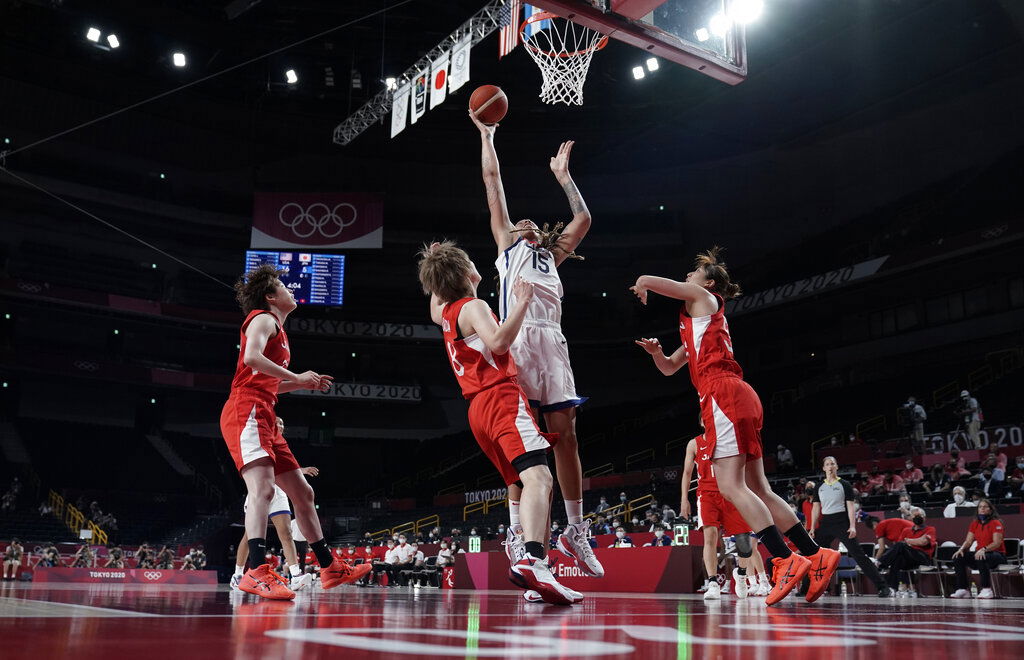 United States' Brittney Griner (15) shoots over Japan's Maki Takada (8) during women's basketball gold medal game at the Summer Olympics in Saitama, Japan. 