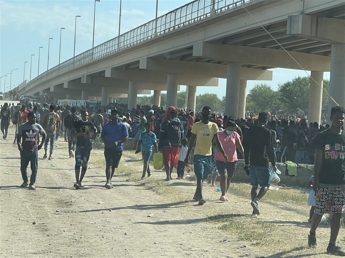 Migrants massed under the international bridge in Del Rio, Texas.