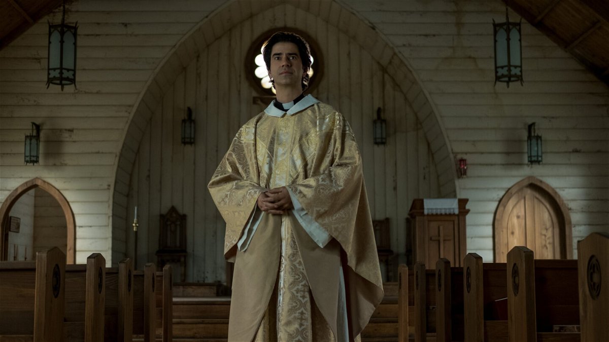 <i>Eike Schroter/Netflix</i><br/>Hamish Linklater plays a mysterious priest in the Netflix series 'Midnight Mass.'