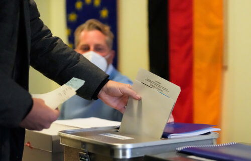 A man casts his vote in Germany's national parliamentary election at a polling station in Berlin