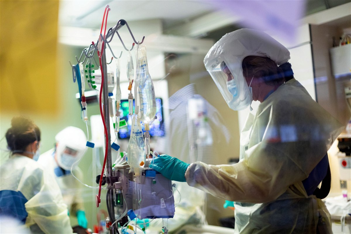 <i>Kyle Green/AP</i><br/>Jack Kingsley R.N. attends to a Covid-19 patient in the Medical Intensive Care Unit at St. Luke's Boise Medical Center in Boise