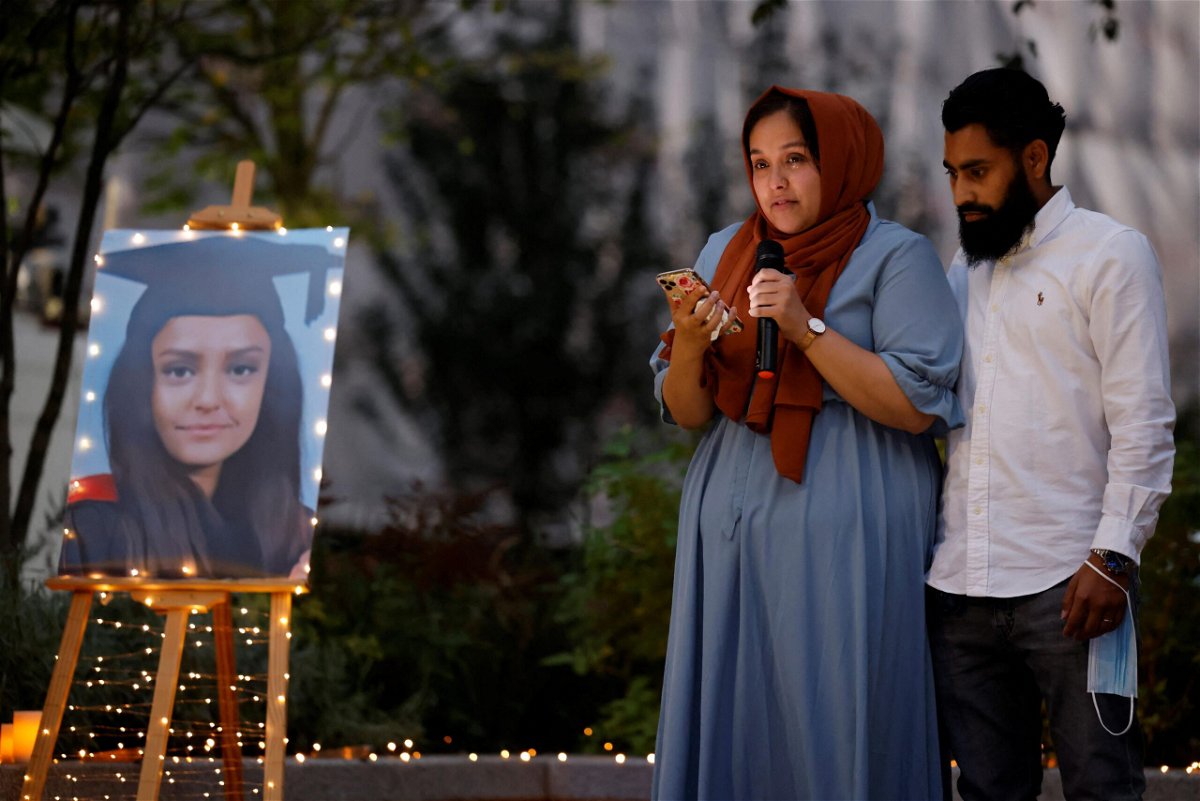 <i>Tolga Akmen/AFP/Getty Images</i><br/>Jebina Nessa pays tribute to her sister Sabina Nessa during the vigil.
