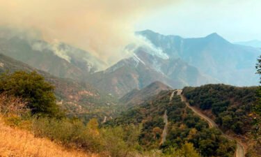 A pair of wildfires burning in California's parched Sierra Nevada mountains